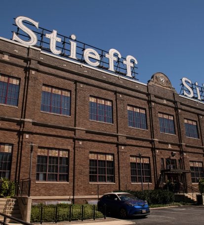 The Stieff building is pictured from the parking lot on a clear day.