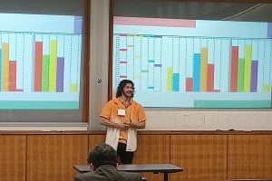 A photo of Diran Jimenez presenting his systems engineering model to optimize the brewing schedule at Union Craft Brewery