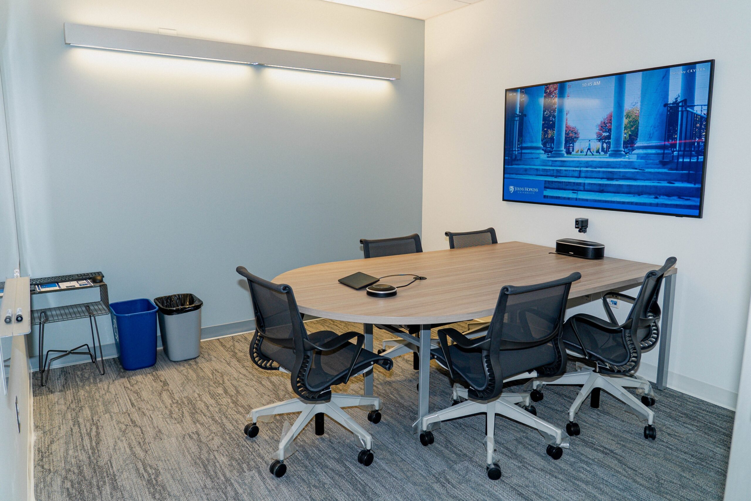 HuddleRoom JHU WSE huddle room with conference table and multimedia equipment