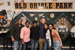 MSEM students and MSEM Director Trevor Mackesey inside Camden Yards.