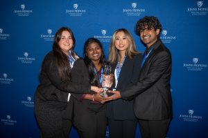 Team IRIS displaying their trophy at the HopStart awards ceremony