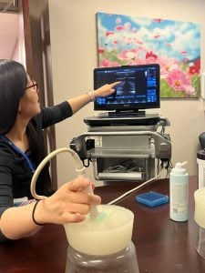 A technicians demonstrates a point-of-care ultrasound.