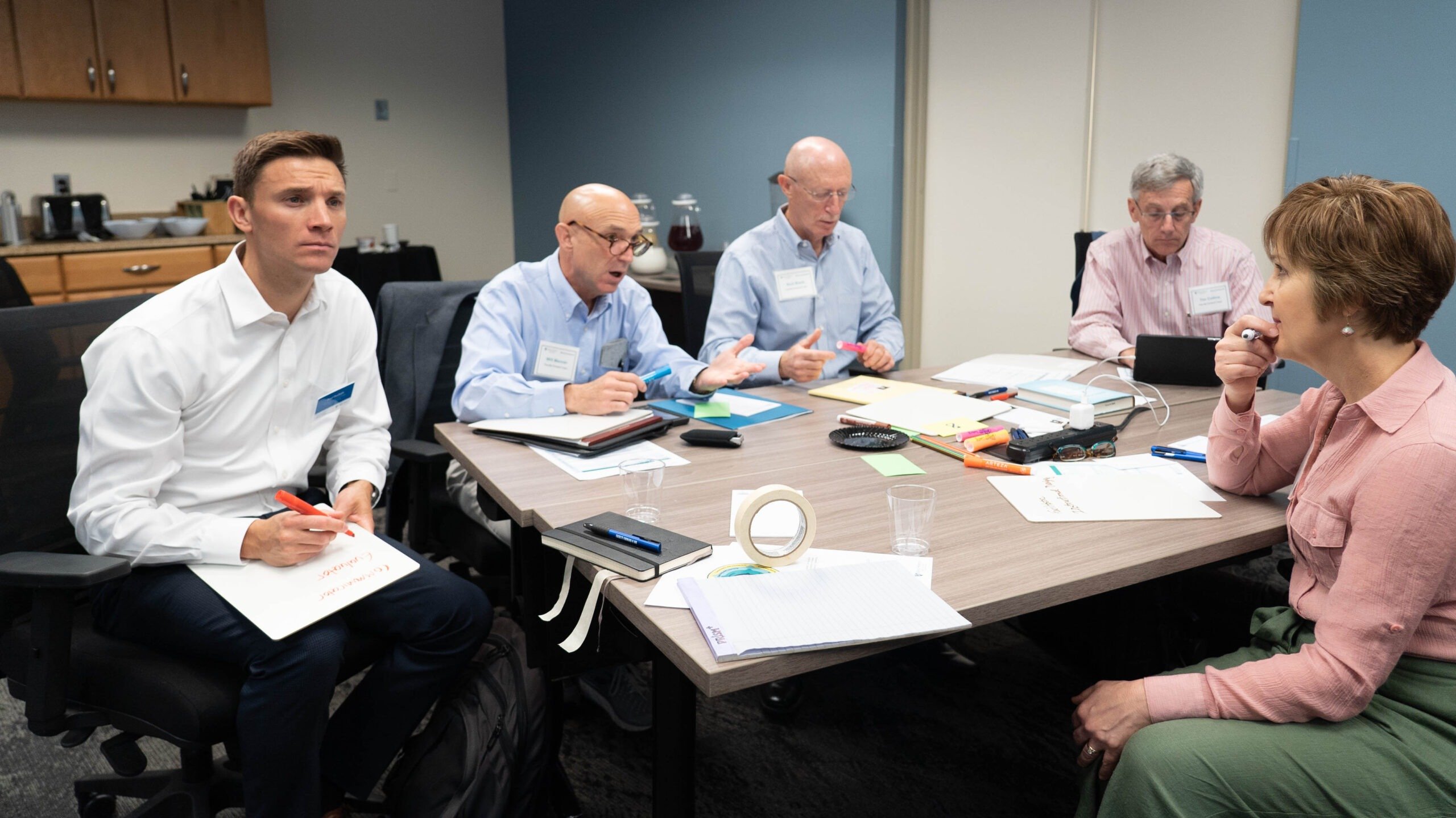 JHU WSE Faculty and CTLD staff at a table taking notes