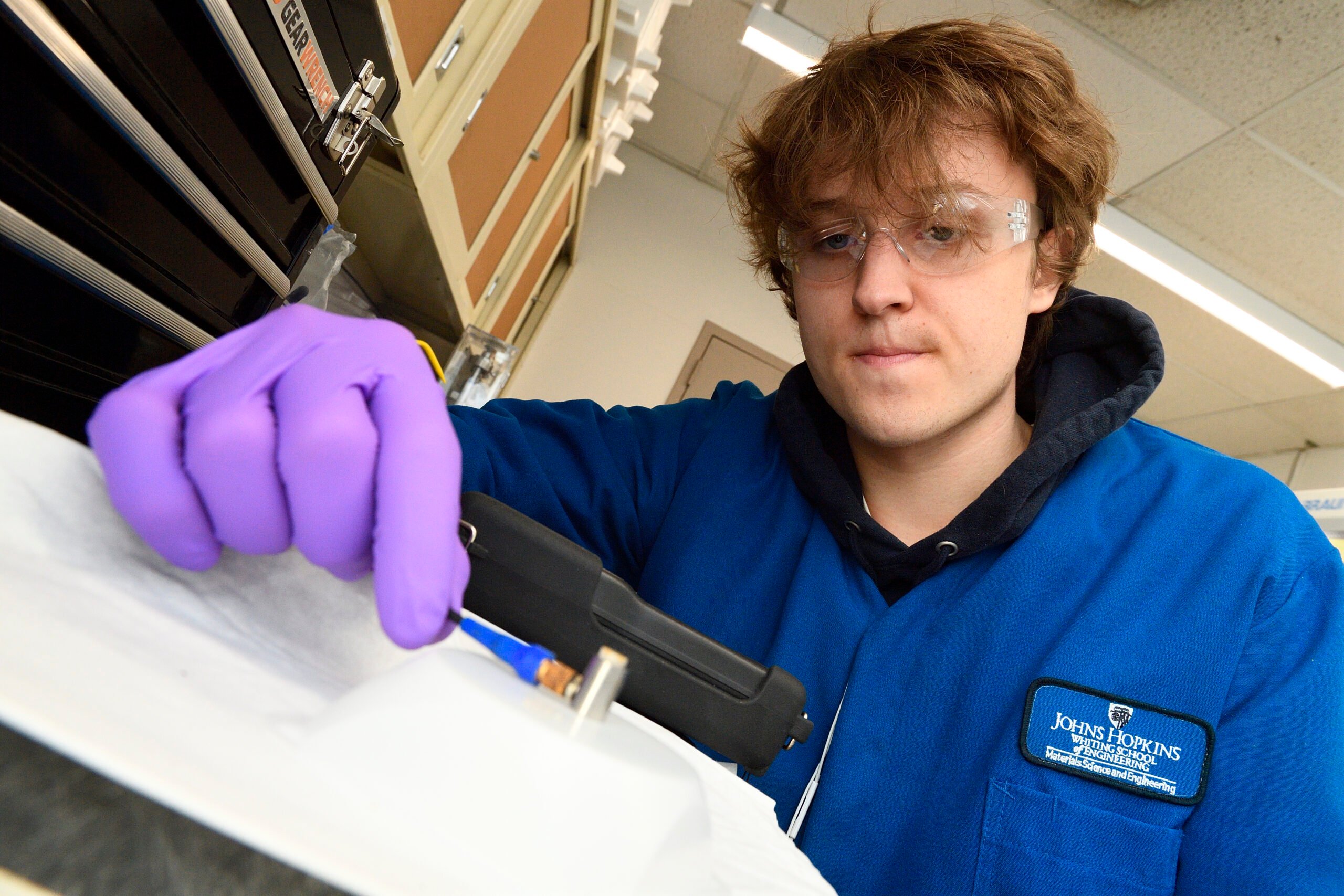 Student Liam McMullin testing the material for use in a solid-state battery.