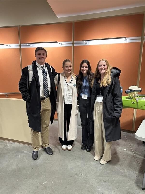 THe four person team of TEXTRON26