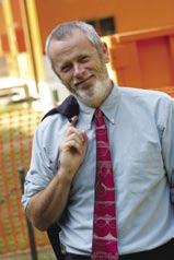 Dean Jones pauses in front of the construction site for the new Computational Sciences and Engineering Building.
