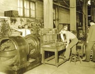 During World War II, Hopkins Engineering laboratories aided the defense effort in such areas as microwave research. In this pre-war photo (circa 1940), Hopkins engineers work together at a generator.