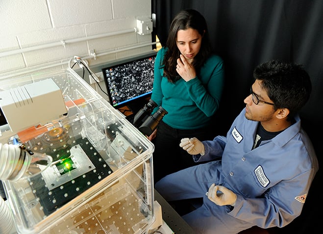 Rebecca Schulman, left, and postdoctoral fellow Abdul Mohammed, PhD '16
