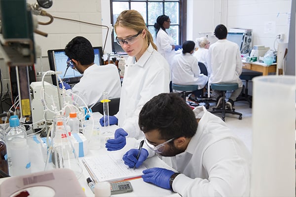 JHU students in a research lab