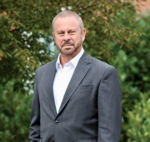 A photo of Dean Ed Schlesinger.
