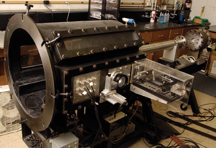 Above is the Plate Impact Accelerator, which tests materials at very high rates of loading, an approach to measuring how fast the sample deforms upon impact. The gun fires a projectile (bottom) that is precisely angled to meet a mirrored disc inside the chamber (left), which reflects light from the hydo-laser setup (not shown). The amount of movement is measured and the data collected.