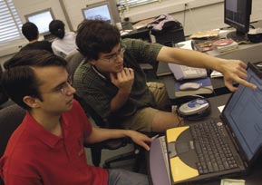 Undergraduates David W. Kirsch (left) of Lehigh University and Philip Bramsen of MIT worked together on techniques to improve computer recognition of accented speech, one of the three team projects at the Center for Language and Speech Processing (CLSP) Summer Workshop on Language Engineering.