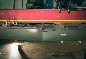 A cold-formed steel purlin undergoes a bending test in the laboratory of Schafer’s research group.