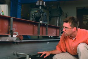 In constructing airplane skins, ship hulls, bridges, culverts, and low-rise buildings, thin is in. But at what point might thin-walled structures buckle? That’s one question being investigated by Benjamin W. Schafer, who is using a hydraulic actuator to conduct tests.