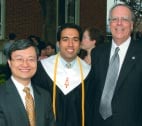 At Commencement in May, Roger Westgate (right) greeted Kwok-leung Li ’79 (left) and Ravi Kavasery ’03.