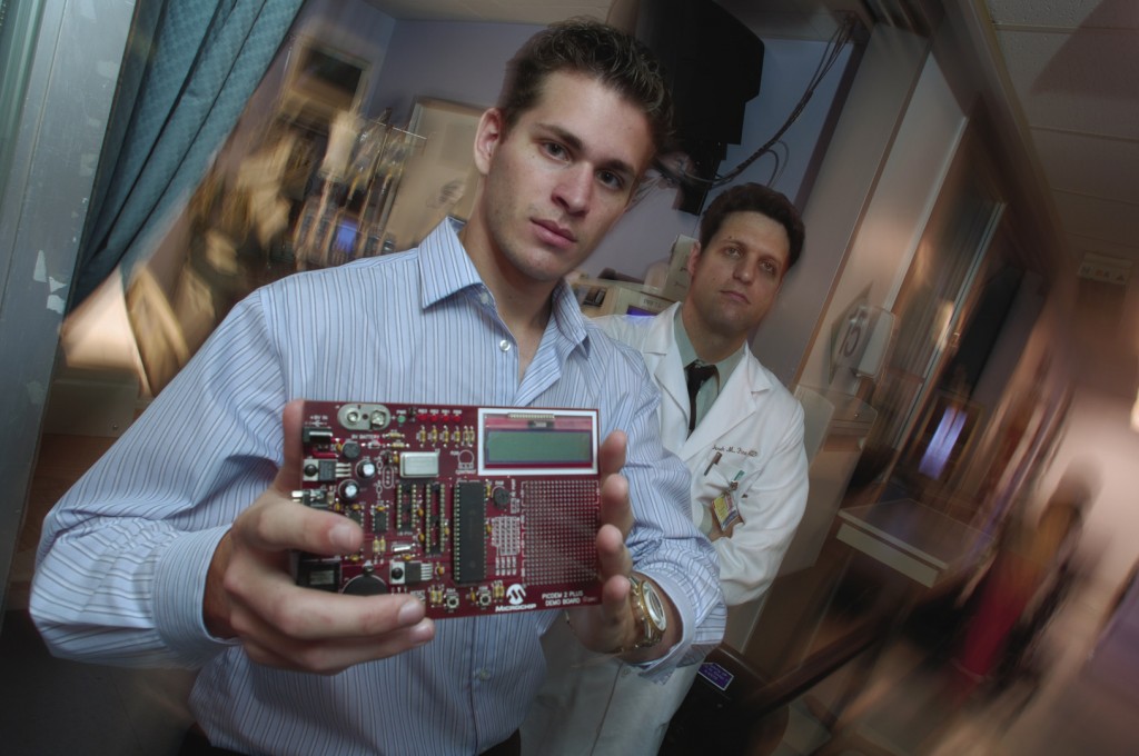 An interest in wireless embedded systems drew Richard Boyer ’07 (left) to become part of a Whiting School student team that designed a device to detect kidney failure for patients in intensive care. The team’s adviser was Derek M. Fine, a Johns Hopkins nephrologist (right).