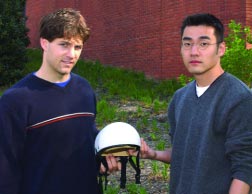 Seniors Michael Cordeiro (left) and Chang Lee constructed a helmet to absorb the shocks that can cause serious head injuries for whitewater enthusiasts.