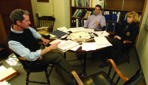 Latting, with admissions officers John Birney and Sherryl Fletcher, considers applications that have made it through the first round.