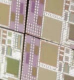 These 3-D silicon chips developed by professor Andreas Andreou replicate the brain’s neural hardware.