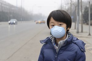 Boy wearing surgical mask