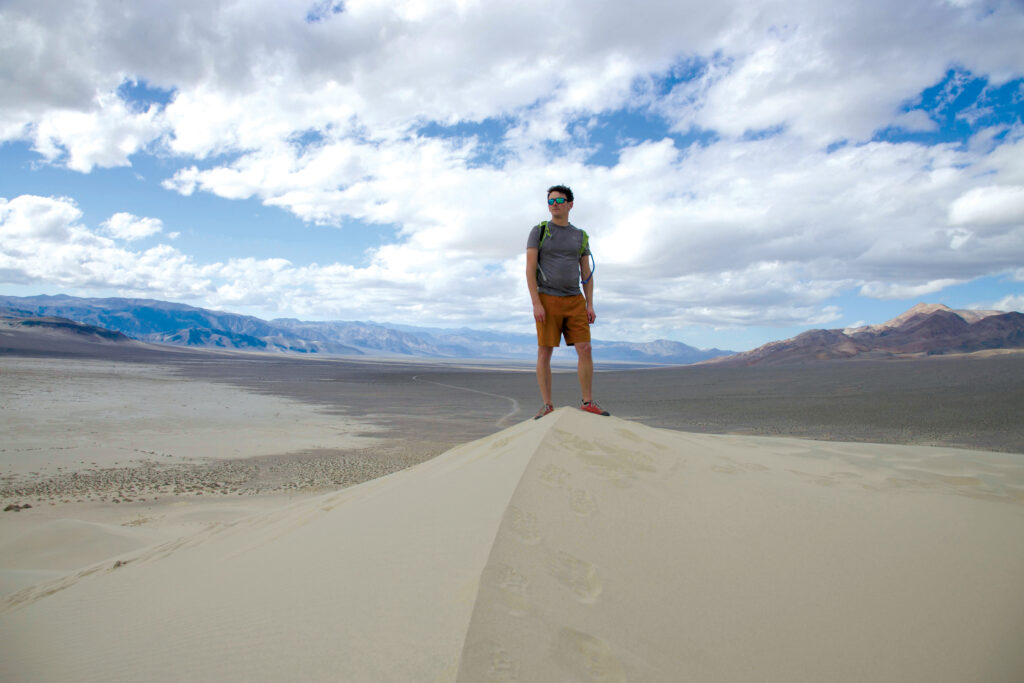 Scot Miller standing in the desert in Death Valley