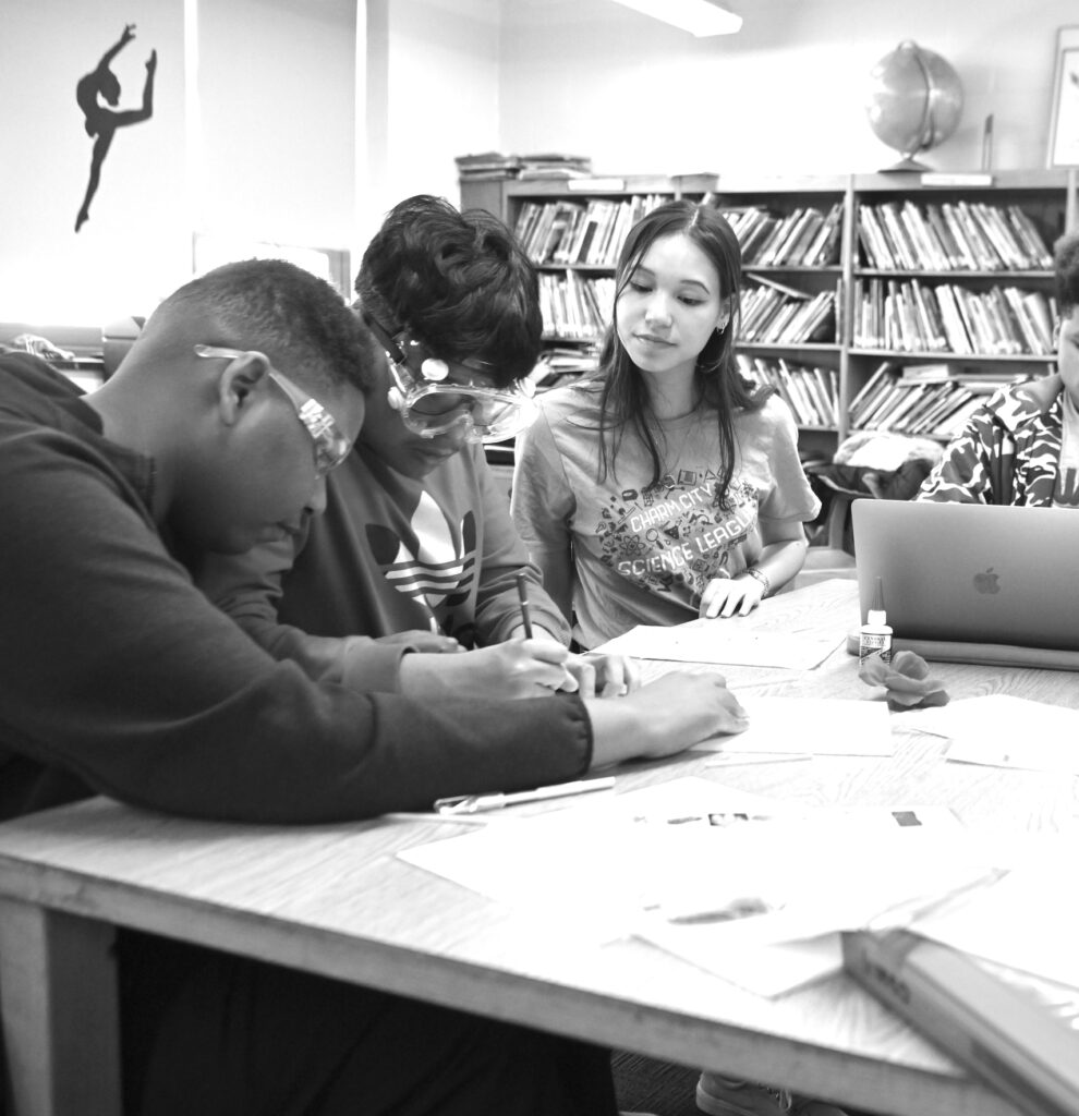 Emily Sperring (right) provides mentorship to students.