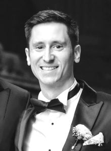 A black and white photo of Nick DeSantis.