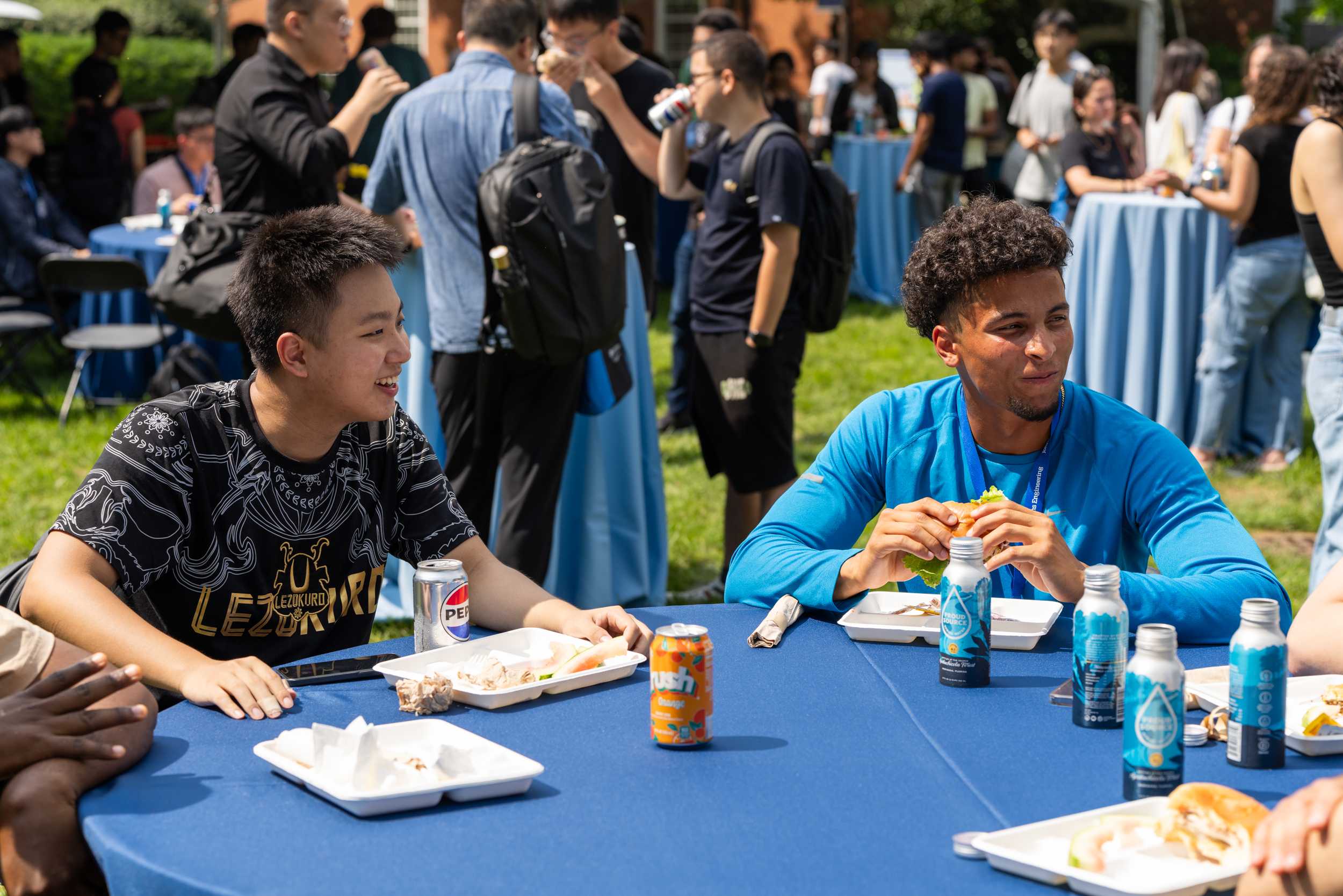 Students eating lunch at a table.