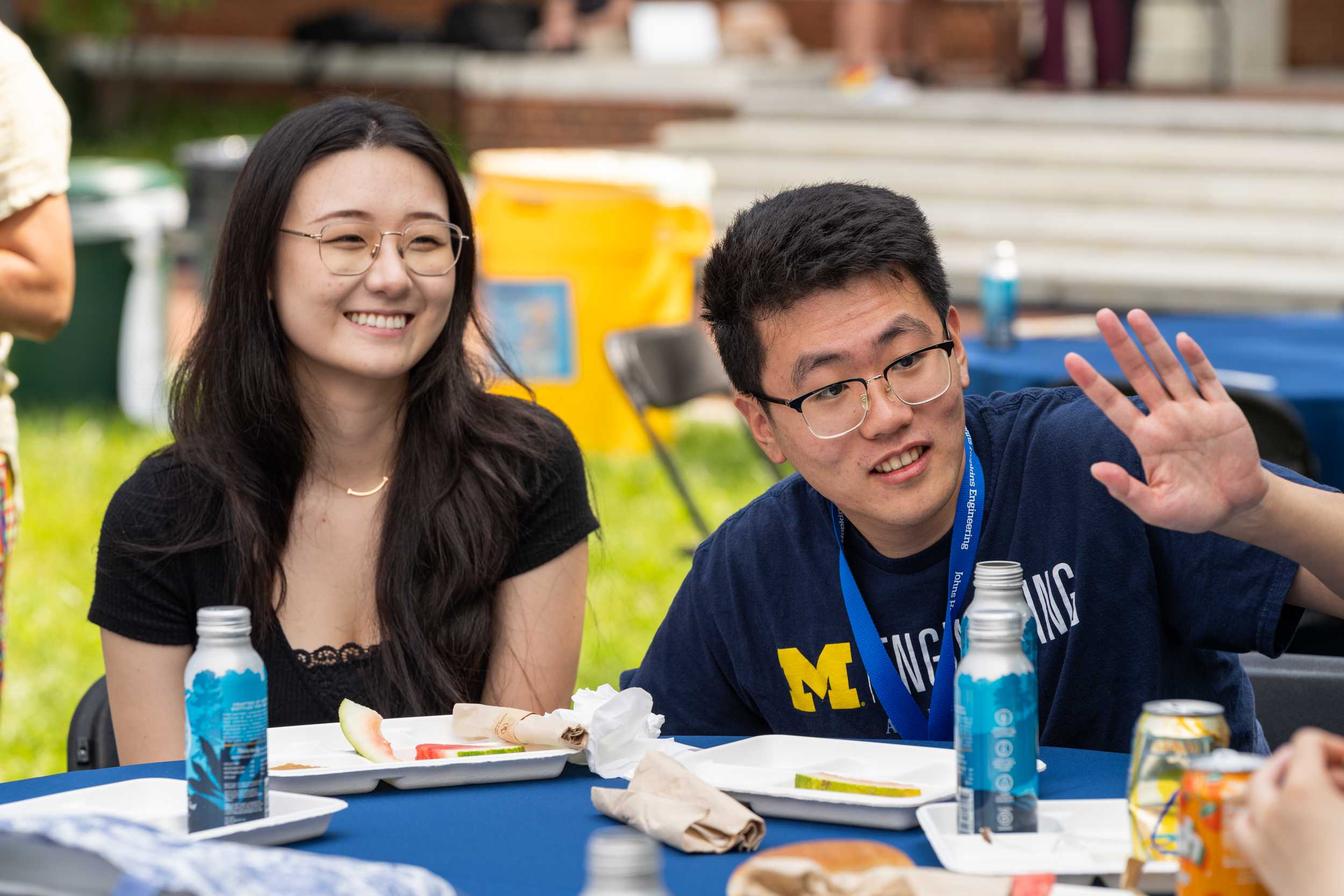 Students eating lunch at a table.