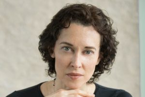 A headshot of Jennifer Elisseeff wearing black t-shirt.