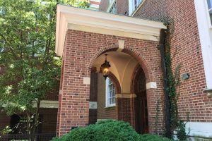 An arched entrance to one of the buildings on the campus.