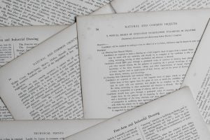 A spread of the hardcopies of the research papers.