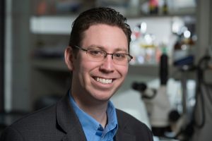 Jordan Green, professor of biomedical engineering at Johns Hopkins University, standing in a research lab