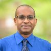 Outdoors headshot photography of Sathappan Ramesh.