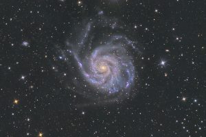 A spiral galaxy against a starfield.
