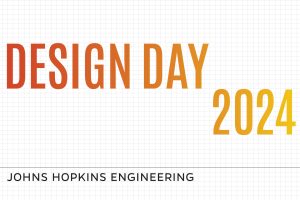 The words "Design Day 2024" in yellow-orange colors" followed by "Johns Hopkins Engineering" in black font on a grid background. 