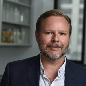 Jeff Coller headshot photo in a lab