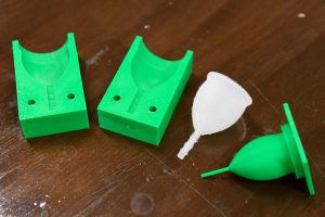 Prototype and molds of a menstrual cup. 