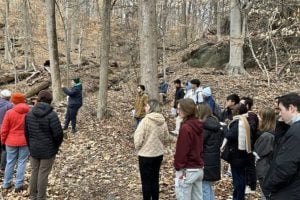 Guided by a representative from Baltimore City Recreation and Parks, students took part in a site walk of the Stream Trail.