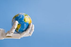Robot holding earth globe in hand with blue background