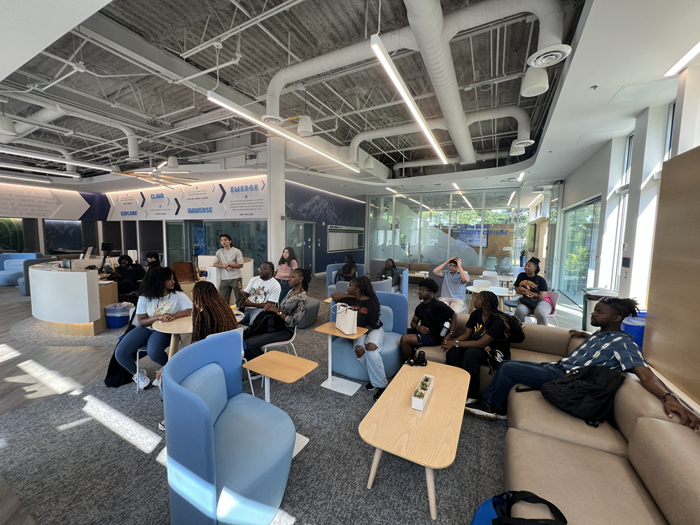 Propel students sitting listening to part of the program