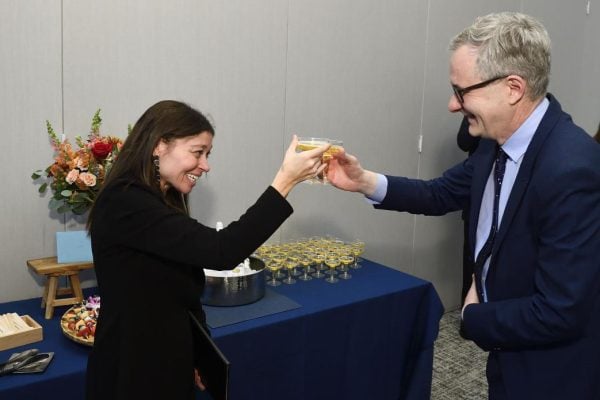 Jamie Spangler shares a toast with Denis Wirtz, vice provost for research for Johns Hopkins University